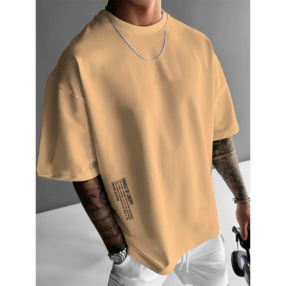 👕 53% הנחה עכשיו! ✨ חולצה לגברים עם שרוולים קצרים גזרה רחבה – תערובת כותנה פרימיום, הדפס גרפי אורבני וסגנון קז'ואל גדול במיוחד🏙️